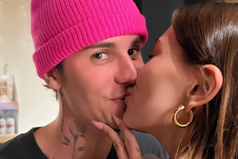 justin-hailey-bieber-kissing-021623-tout-c410b4c908a648e98675c438a7d3ee35